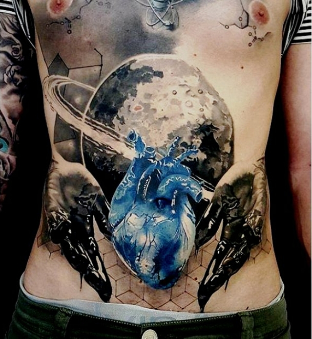 Tattoo-on-the-mans-chest-heart-and-blue-space