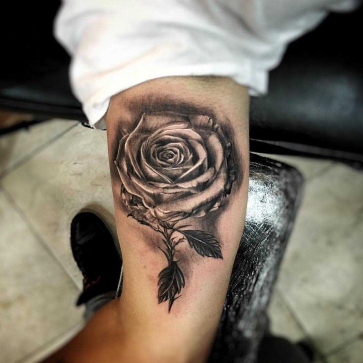 black rose inner bicep tattoo for men
