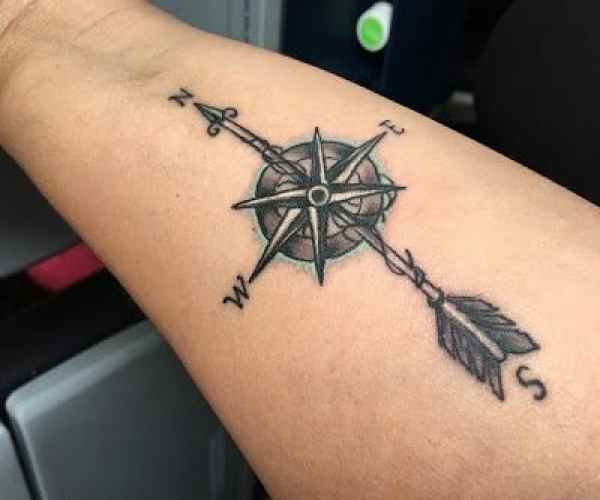 blue accent compass tattoo for guys