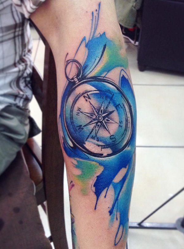blue and green compass tattoo design for men