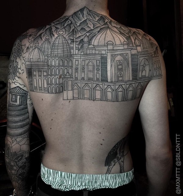 cityscape back tattoo for men