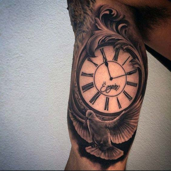 clock and dove inner bicep tattoo for men