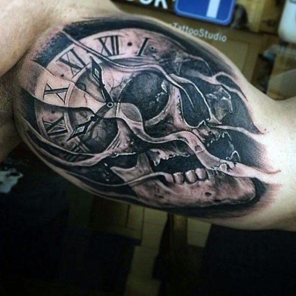 clock and skull inner bicep tattoo for men