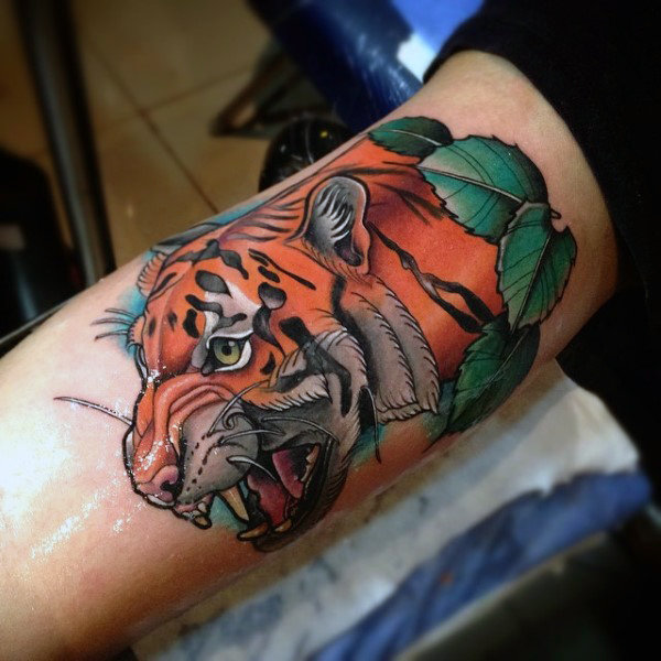 colored tiger face inner bicep tattoo for men