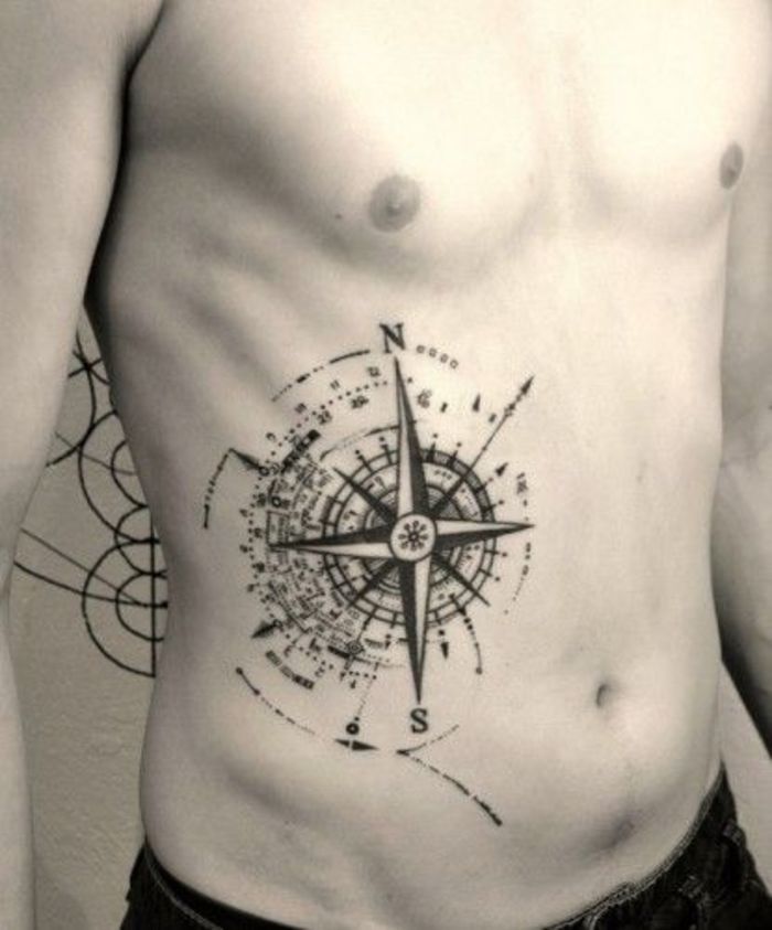 detailed rib compass tattoo for guys