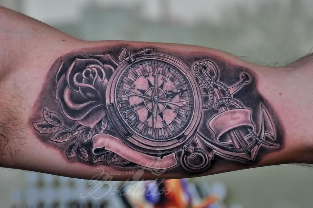 detailed rose, anchor, and compass tattoo for guys