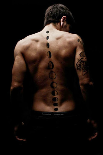 disc spine back tattoo for men