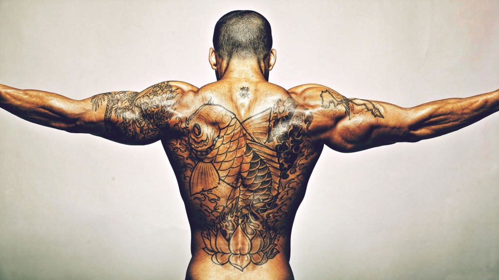 dragon fish back tattoo for men