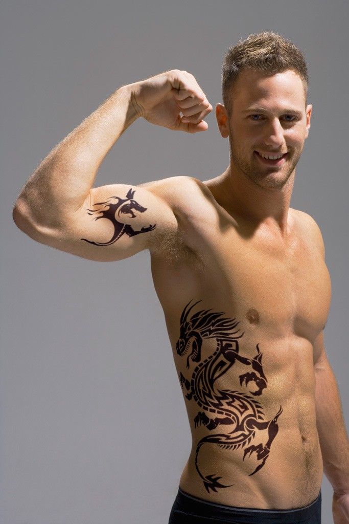 dragon inner bicep tattoo for men
