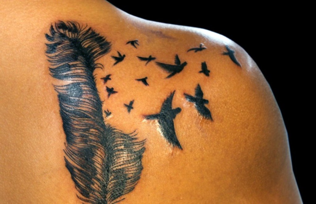 feather and birds back tattoo for men
