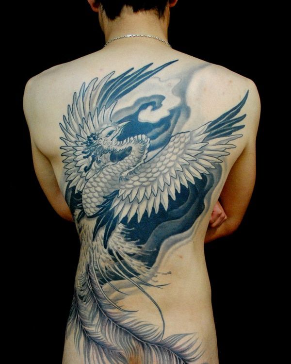 feathered dragon back tattoo for men
