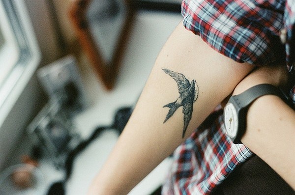 flying bird inner bicep tattoo for men