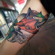 fox face inner bicep tattoo for men
