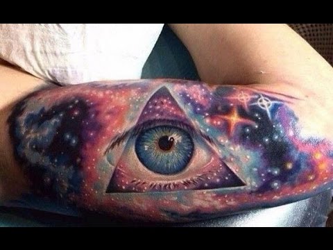 galaxy eye tattoo arm