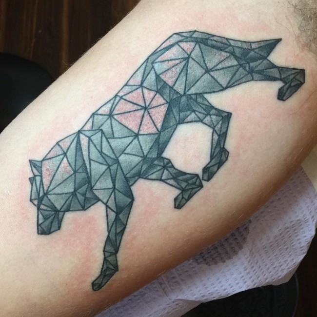 geometric lion inner bicep tattoo for men