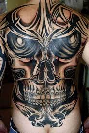 grimacing skull back tattoo for men