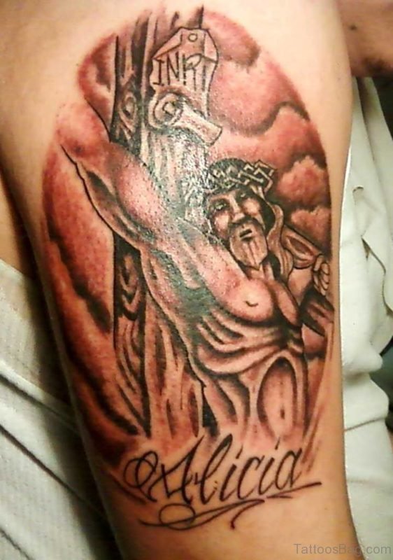 jesus crucified inner bicep tattoo for men