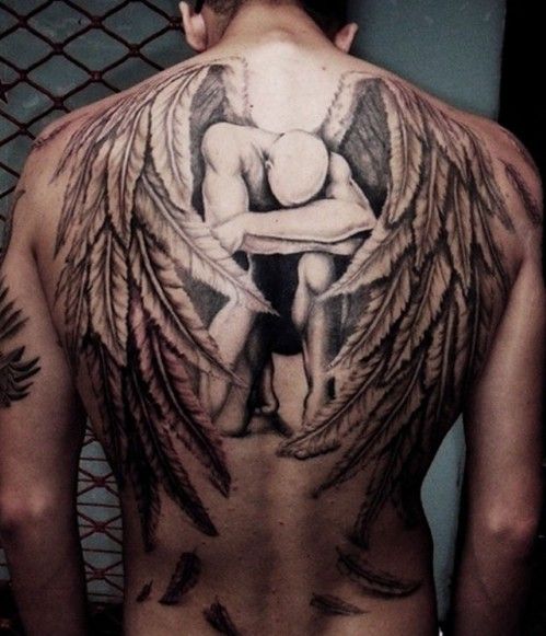 kneeling angel back tattoo for men
