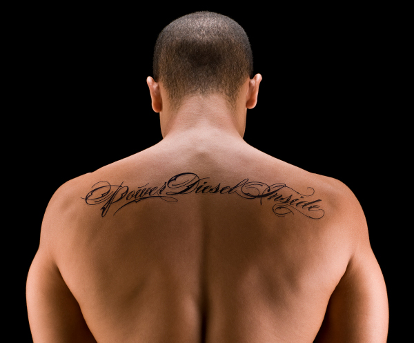 lettering back tattoo for men