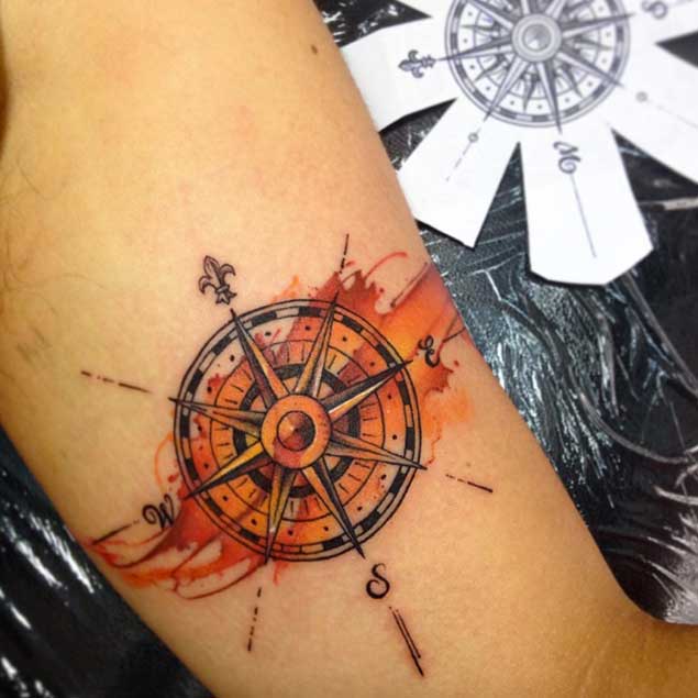 orange accent compass tattoo for men