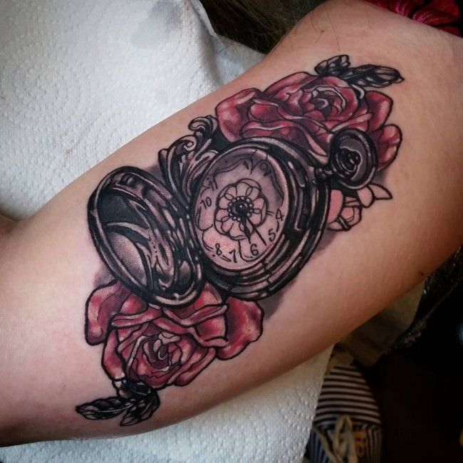 pocket watch and roses inner bicep tattoo for men
