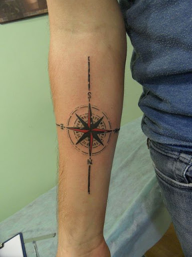 red accent compass tattoo for men