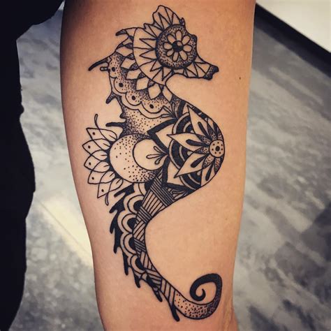 seahorse inner bicep tattoo for men