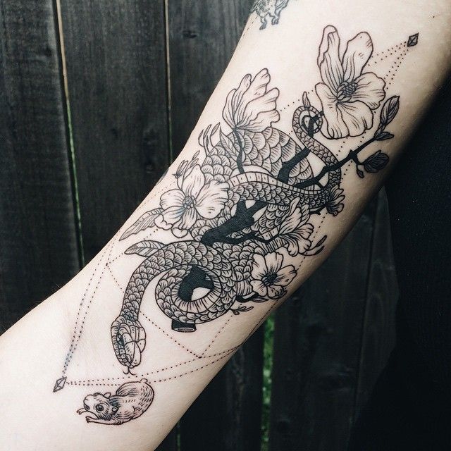 snake and flowers inner bicep tattoo for men