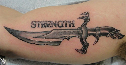 sword inner bicep tattoo for men