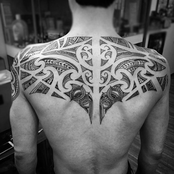 symmetrical back tattoo design for men