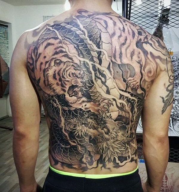 tiger vs dragon back tattoo for men