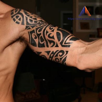 tribal design inner bicep tattoo for men