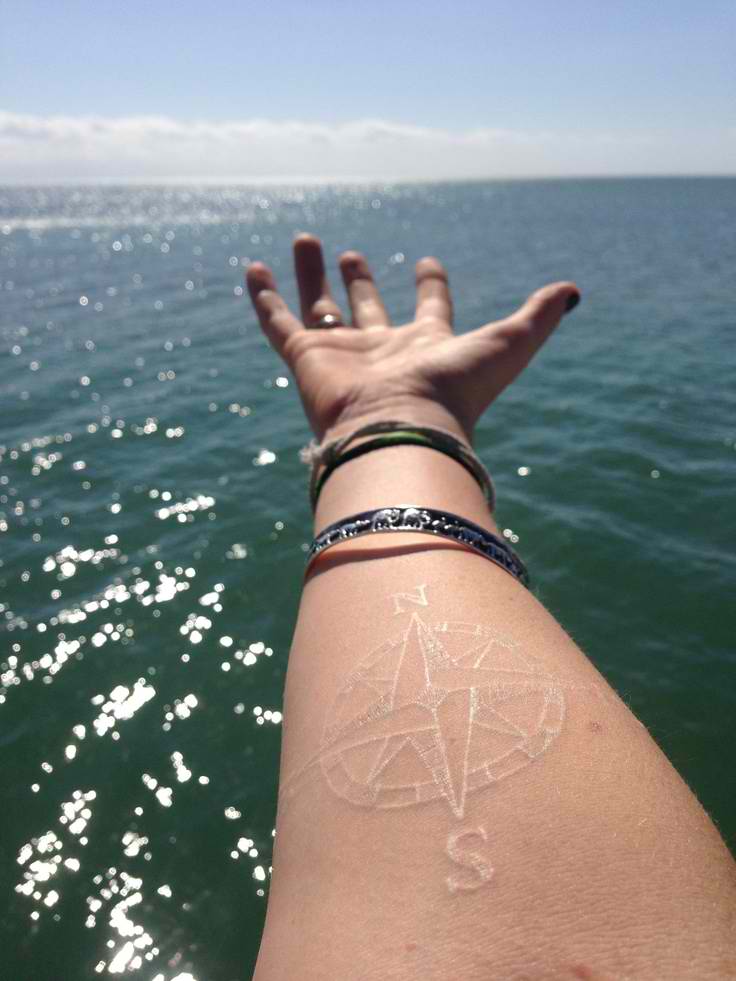 white ink compass tattoo for guys