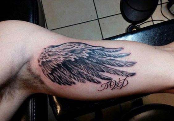wing inner bicep tattoo for men