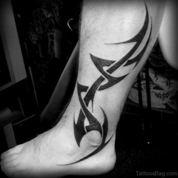 barbs leg tattoo for guys