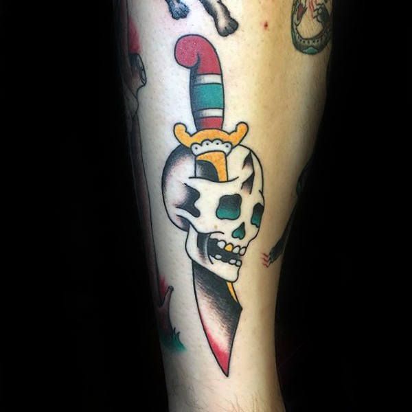 dagger and skull leg tattoo for guys