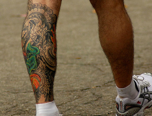 fancy design leg tattoo for men
