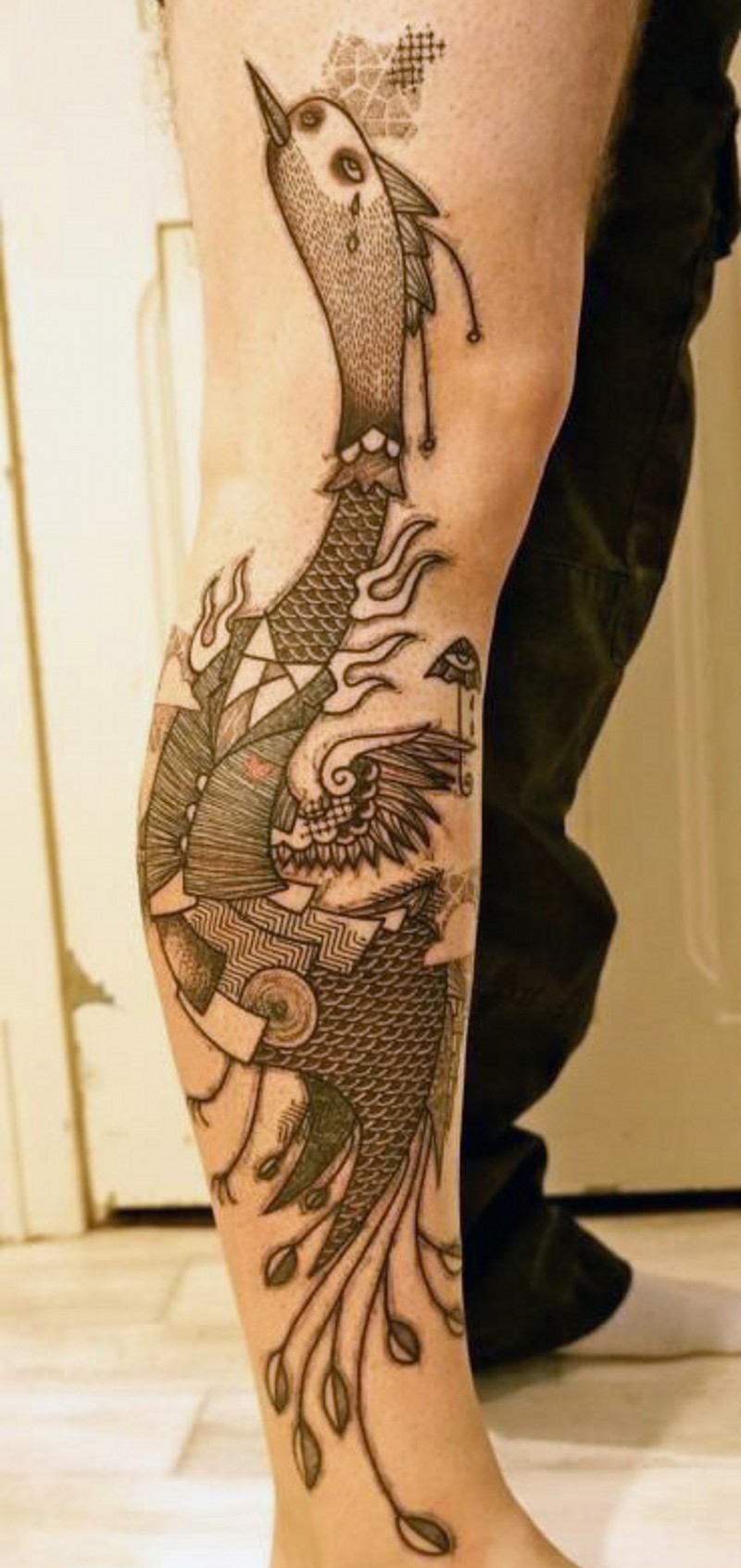 fish leg tattoo for guys