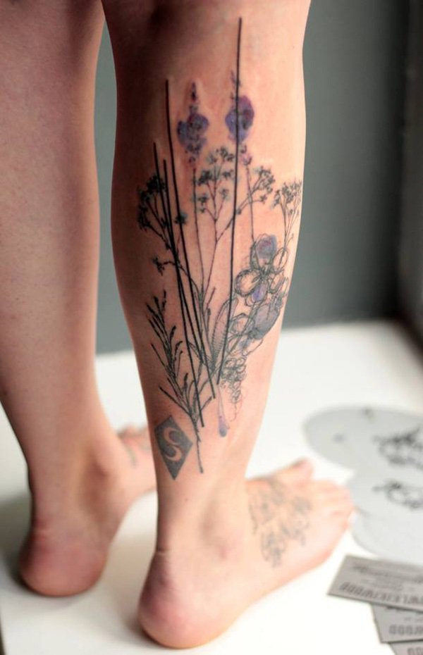 floral leg tattoo for guys