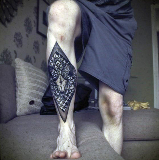 interesting design leg tattoo for men