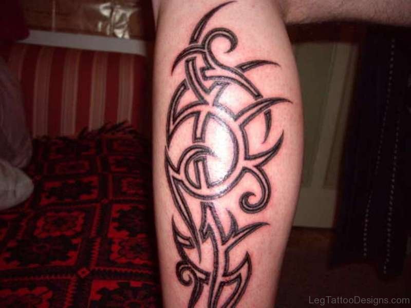 interesting tribal leg tattoo for men