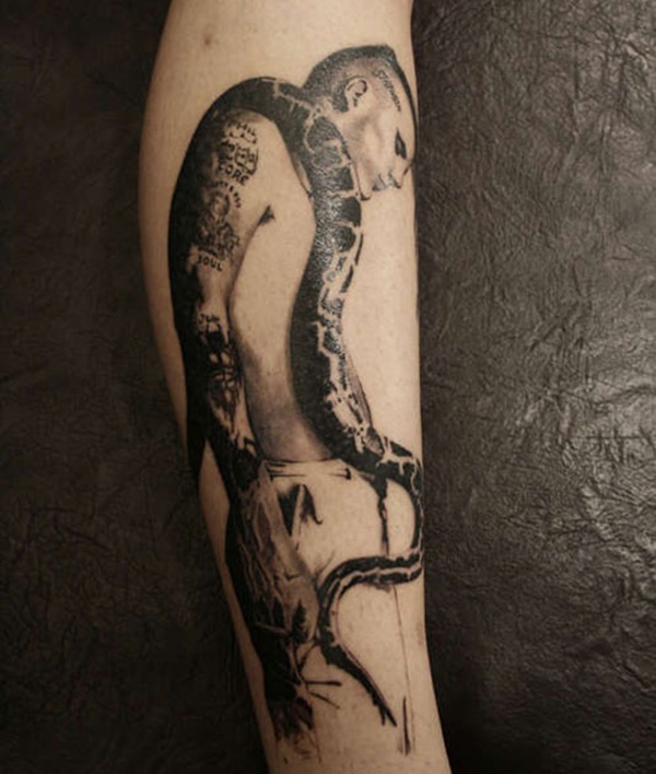 man with snake leg tattoo for guys