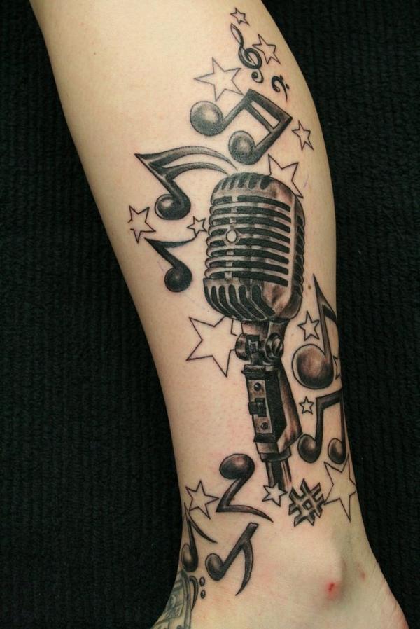 microphone leg tattoo for men