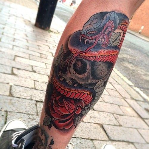 serpent and skull leg tattoo for men