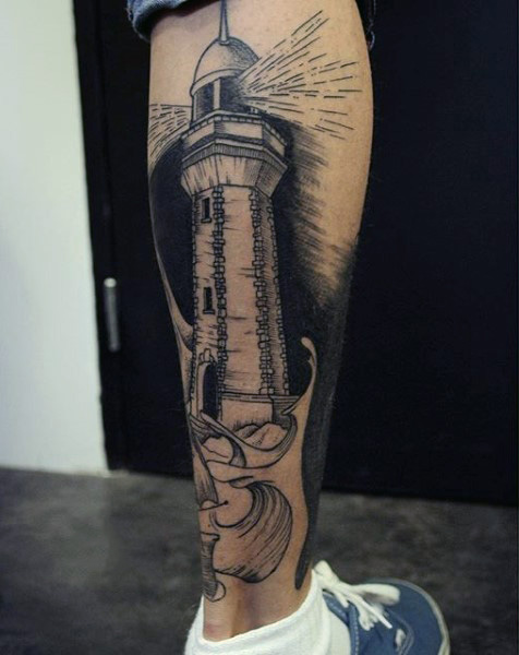 shining lighthouse leg tattoo for guys
