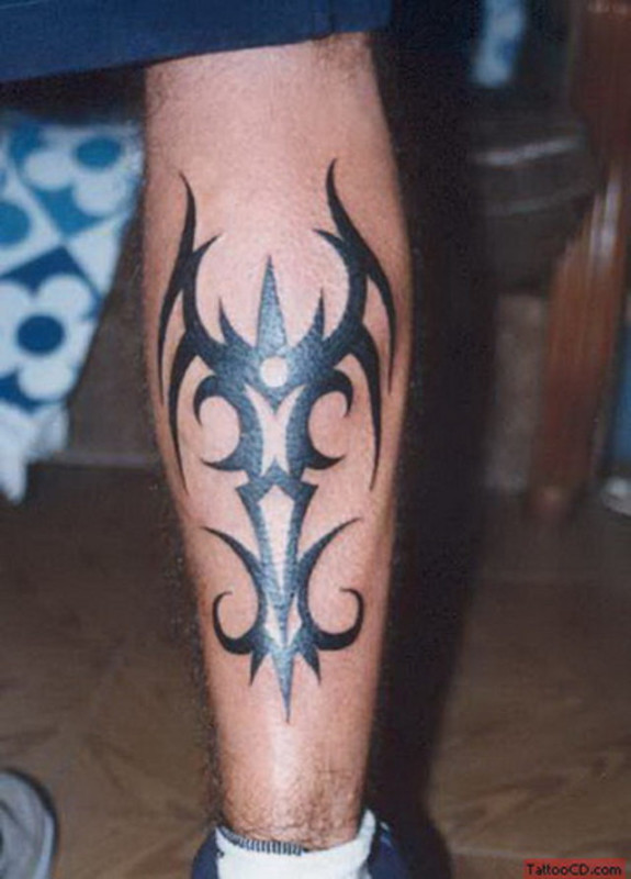tribal symbol leg tattoo for men