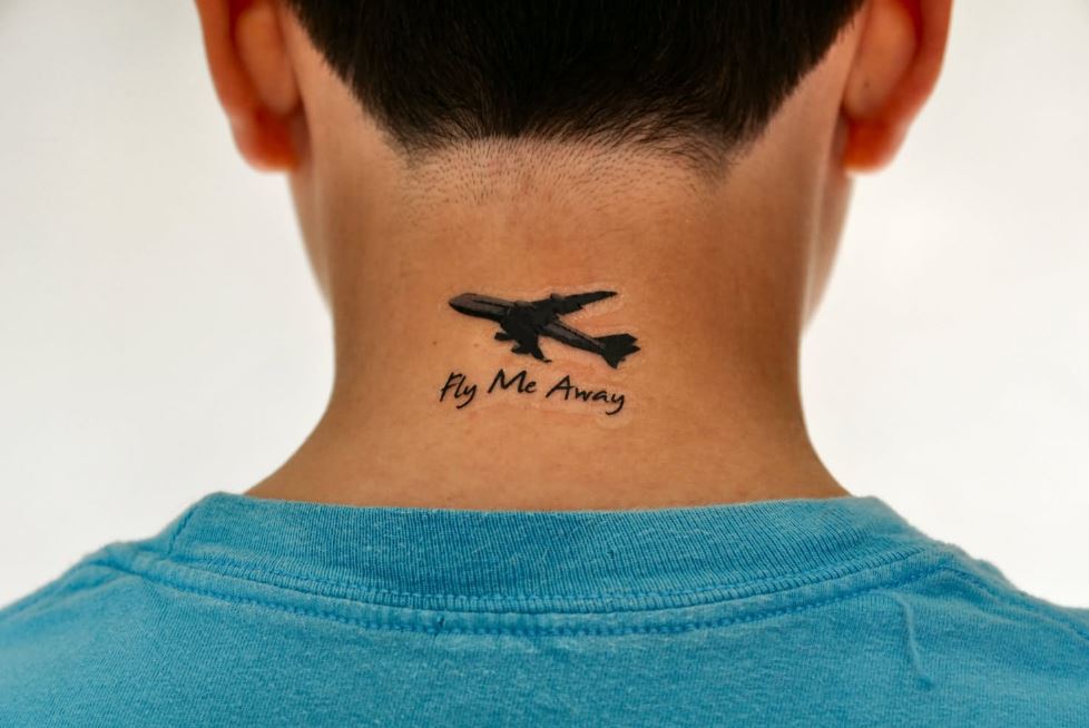 airplane neck tattoo for men
