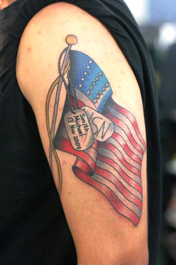 cartoon style dog tags and american flag tattoo for men