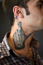 crossed fingers neck tattoo for men