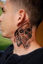 skull and gun neck tattoo for men